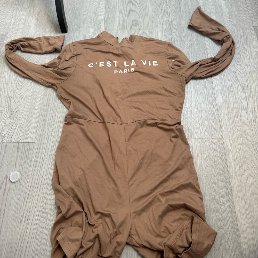 Brown once piece jumpsuit.
